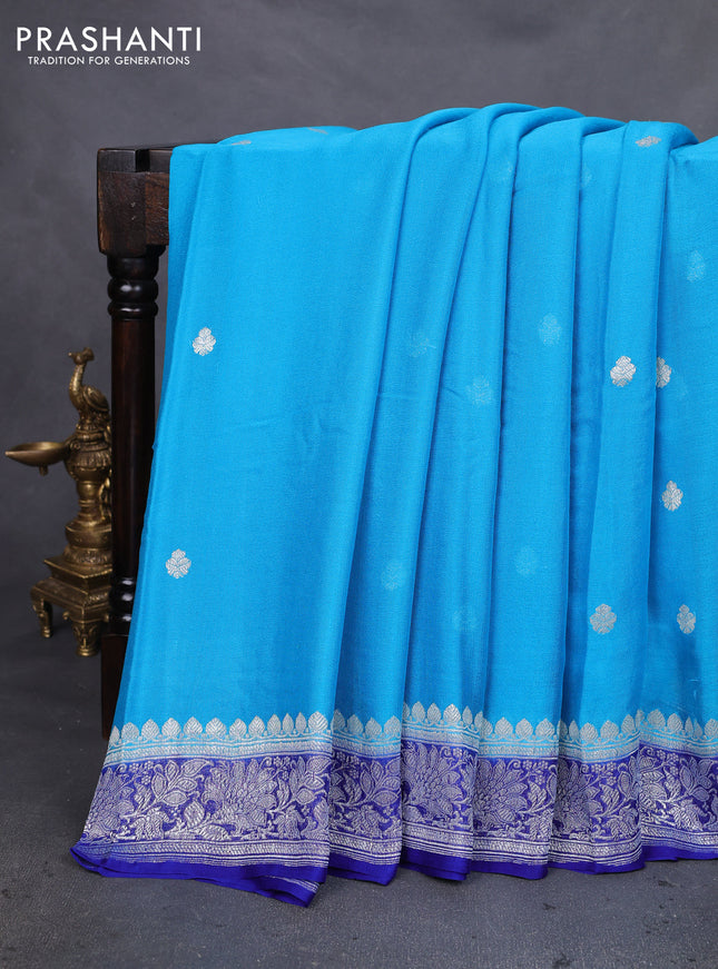 Banarasi chiffon silk saree cs blue and blue with silver zari woven buttas and silver zari woven floral border