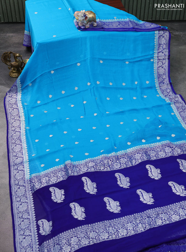 Banarasi chiffon silk saree cs blue and blue with silver zari woven buttas and silver zari woven floral border