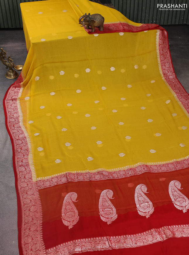 Banarasi chiffon silk saree yellow and red with silver zari woven buttas and silver zari woven floral border