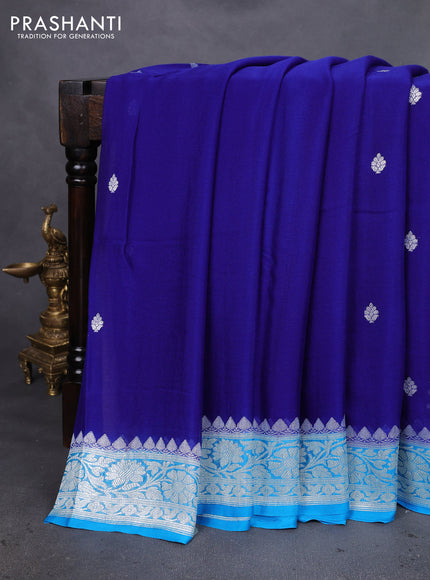 Banarasi chiffon silk saree blue and cs blue with silver zari woven buttas and silver zari woven floral border