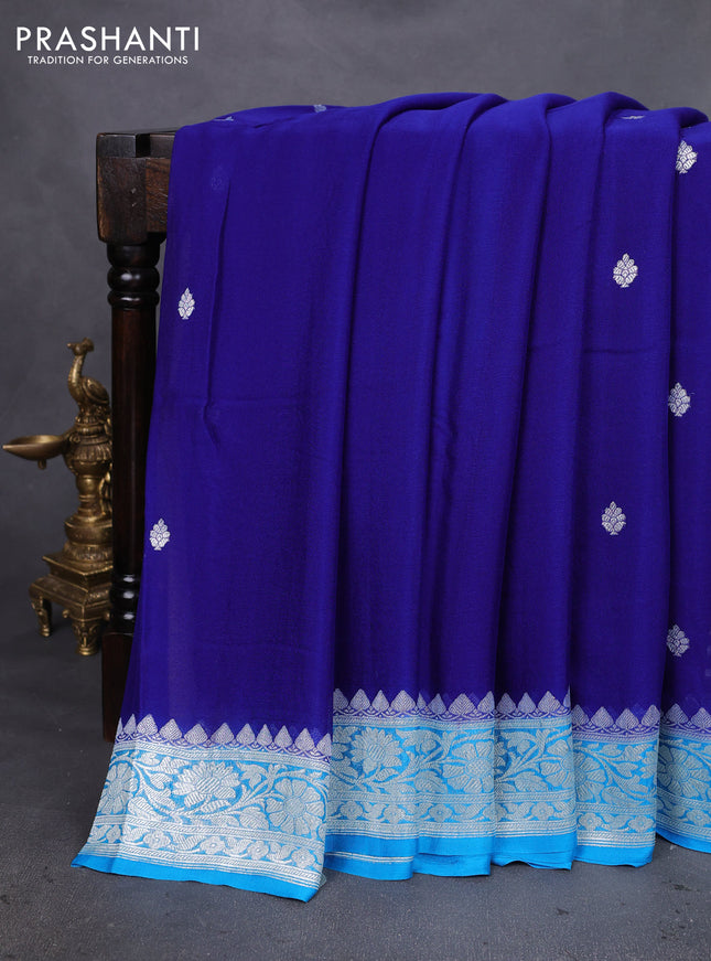 Banarasi chiffon silk saree blue and cs blue with silver zari woven buttas and silver zari woven floral border