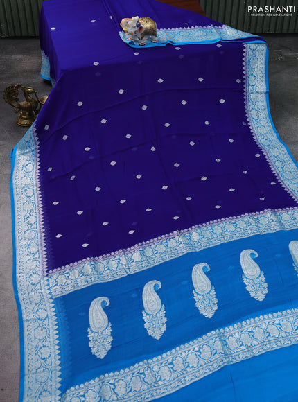 Banarasi chiffon silk saree blue and cs blue with silver zari woven buttas and silver zari woven floral border