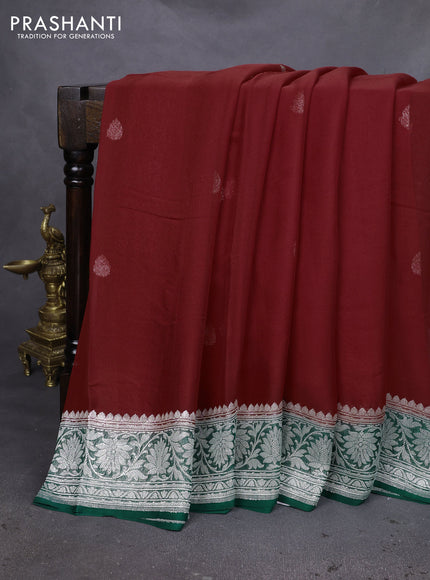 Banarasi chiffon silk saree kumkum red and dark green with silver zari woven buttas and silver zari woven floral border