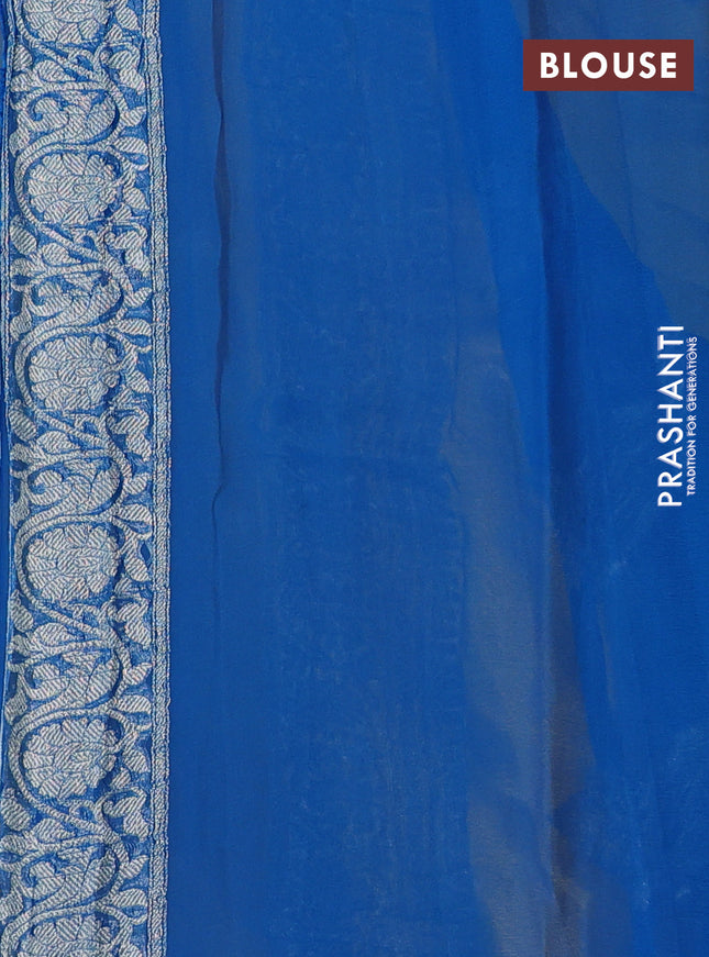 Banarasi chiffon silk saree yellow and cs blue with silver zari woven buttas and silver zari woven floral border