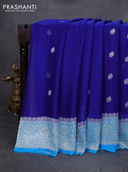 Banarasi chiffon silk saree blue and cs blue with silver zari woven buttas and silver zari woven floral border