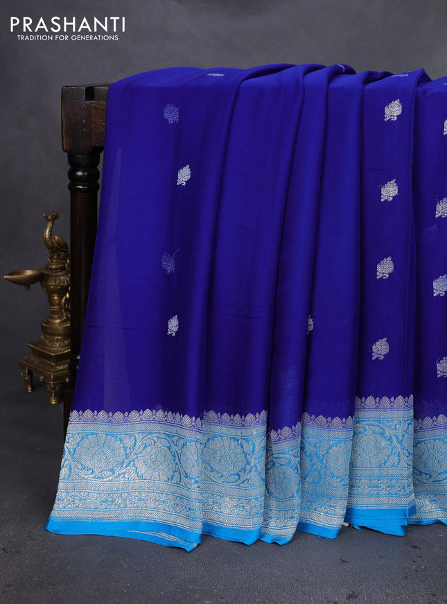 Banarasi chiffon silk saree blue and cs blue with silver zari woven buttas and silver zari woven floral border