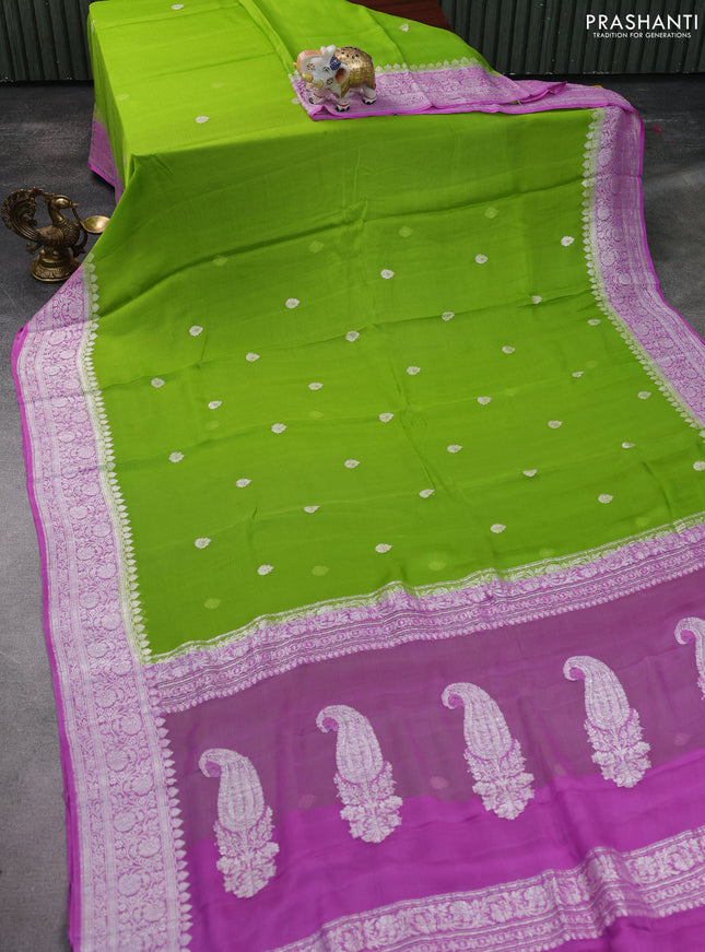 Banarasi chiffon silk saree light green and lavender with silver zari woven buttas and silver zari woven floral border