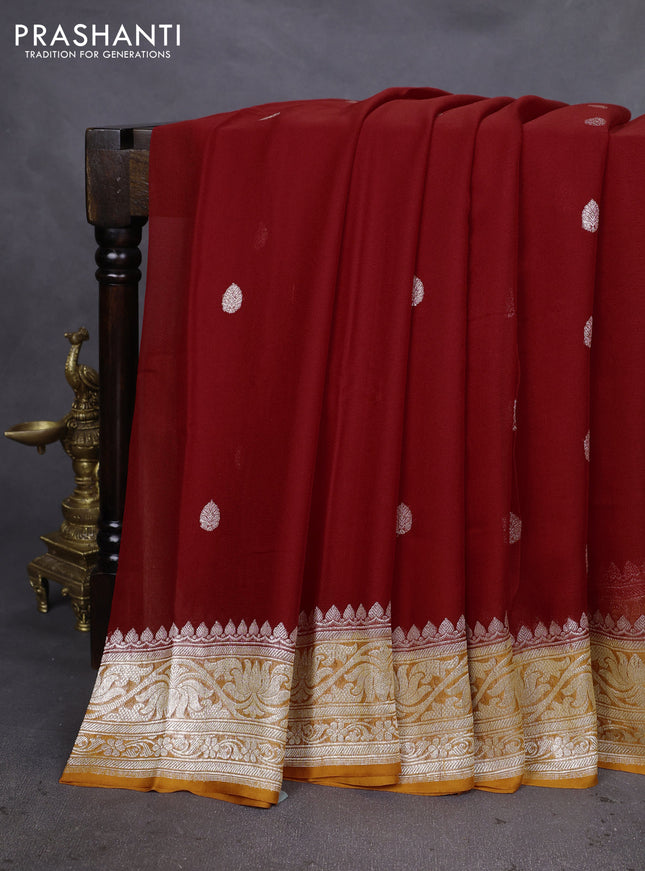 Banarasi chiffon silk saree kumkum red and orange with silver zari woven buttas and silver zari woven floral border