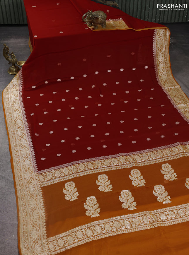 Banarasi chiffon silk saree kumkum red and orange with silver zari woven buttas and silver zari woven floral border