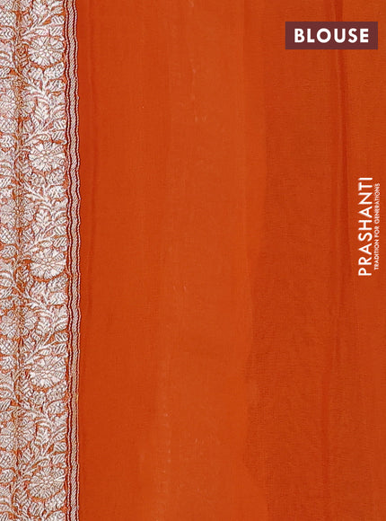 Banarasi chiffon silk saree kumkum red and orange with silver zari woven buttas and silver zari woven floral border