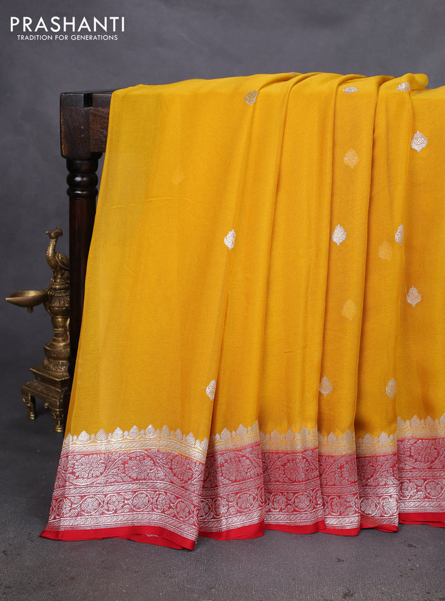 Banarasi chiffon silk saree yellow and red with silver zari woven buttas and silver zari woven floral border