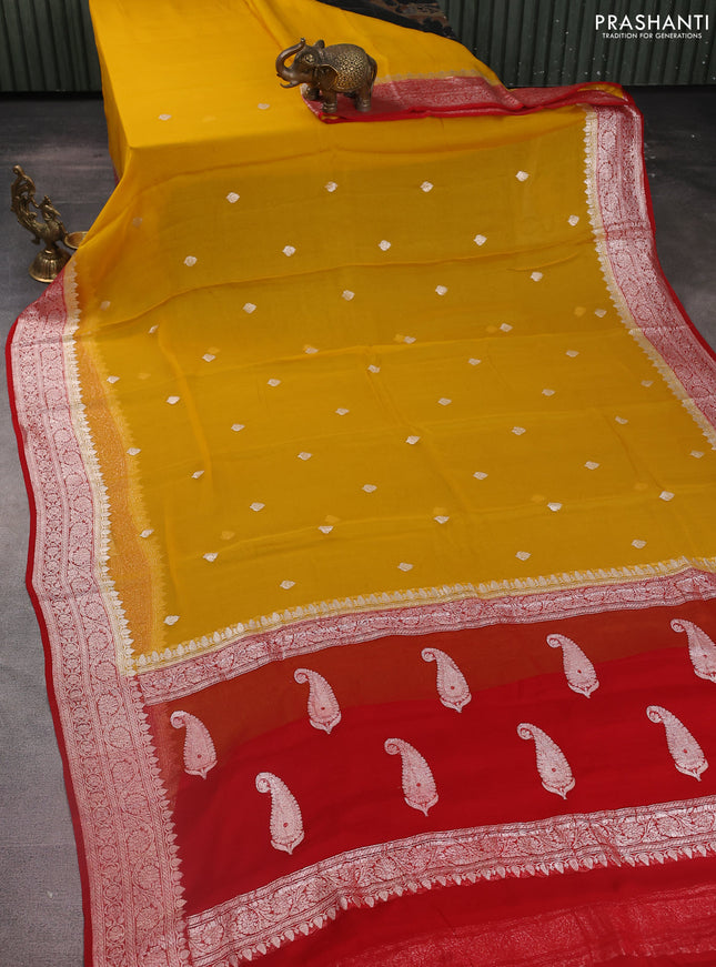 Banarasi chiffon silk saree yellow and red with silver zari woven buttas and silver zari woven floral border