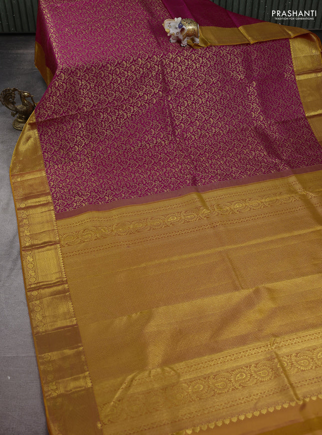 Pure kanchipuram silk saree pink and mustard yellow with allover zari woven brocade weaves and zari woven border