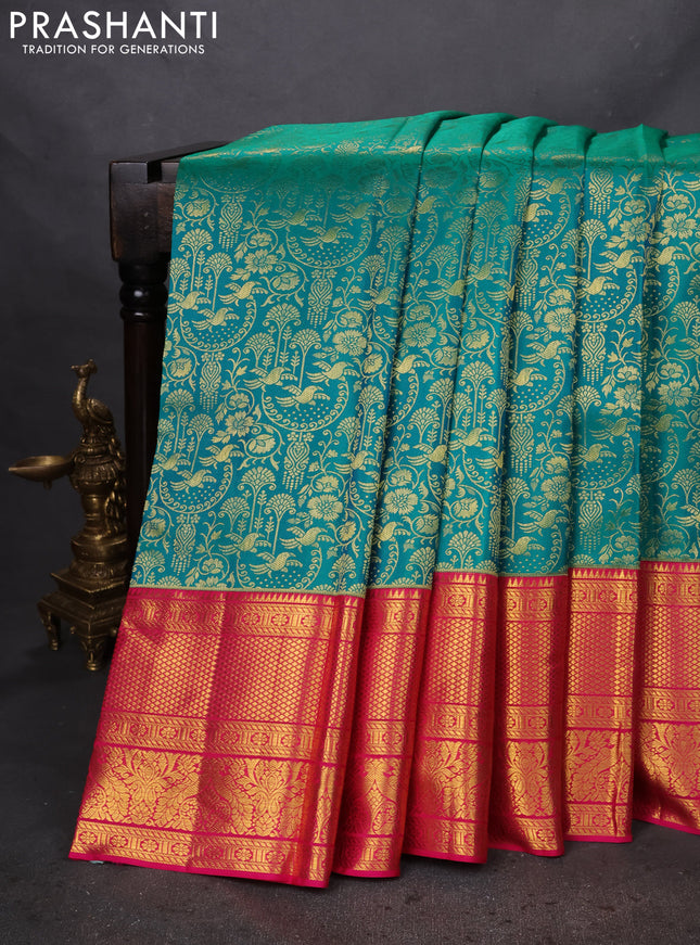Pure kanchipuram silk saree teal green and pink with allover zari woven brocade weaves and zari woven border