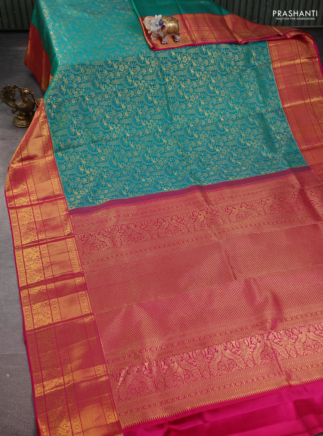 Pure kanchipuram silk saree teal green and pink with allover zari woven brocade weaves and zari woven border