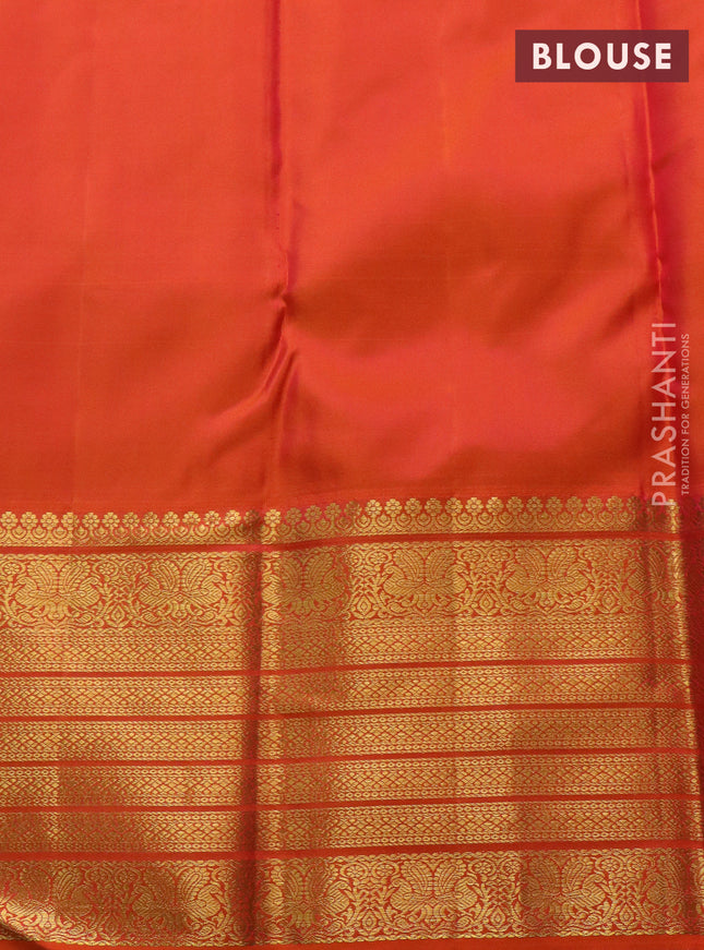Pure kanchipuram silk saree fluorescent green and orange with silver & gold zari woven bird weaves and long zari woven korvai border