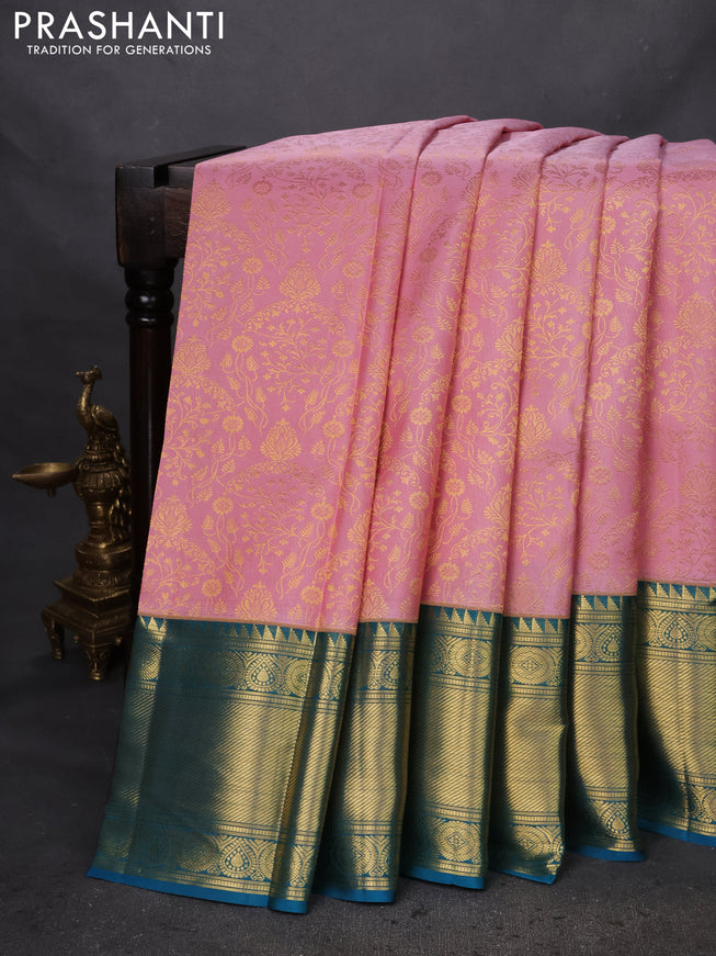 Pure kanchipuram silk saree pastel pink and cs blue with allover zari woven brocade weaves and zari woven border