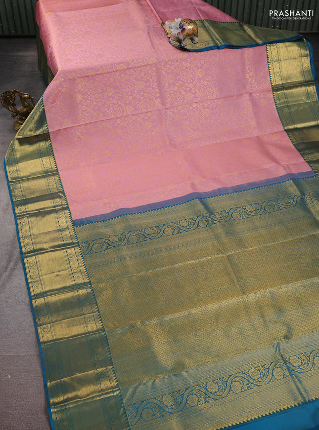 Pure kanchipuram silk saree pastel pink and cs blue with allover zari woven brocade weaves and zari woven border