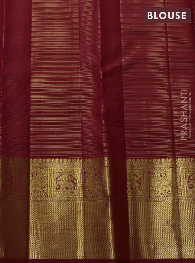 Pure kanchipuram silk saree maroon with allover zari weaves & buttas and zari woven border
