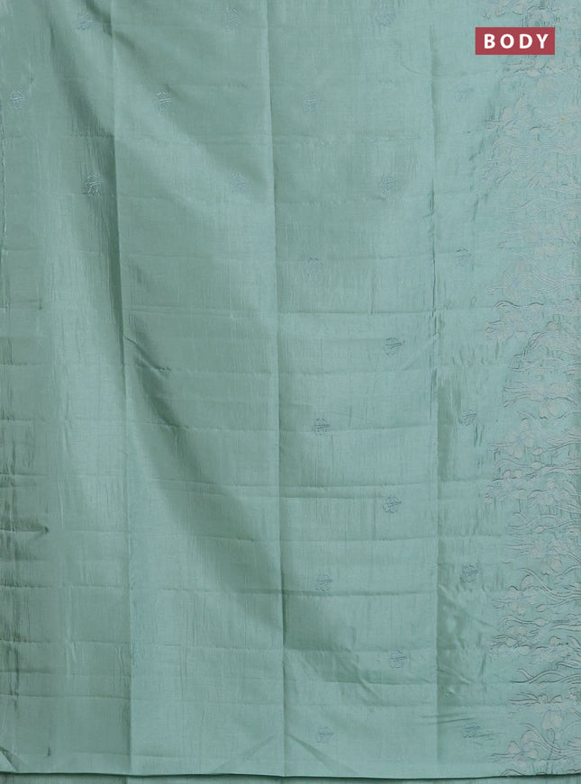 Semi tussar saree pastel green with floral embroidery work and applique work border