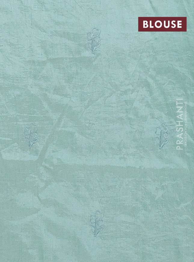 Semi tussar saree pastel green with floral embroidery work and applique work border
