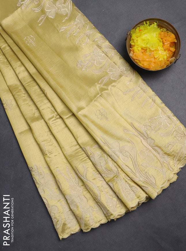 Semi tussar saree mustard shade with floral embroidery work and applique work border