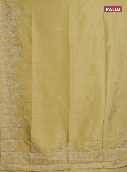 Semi tussar saree mustard shade with floral embroidery work and applique work border