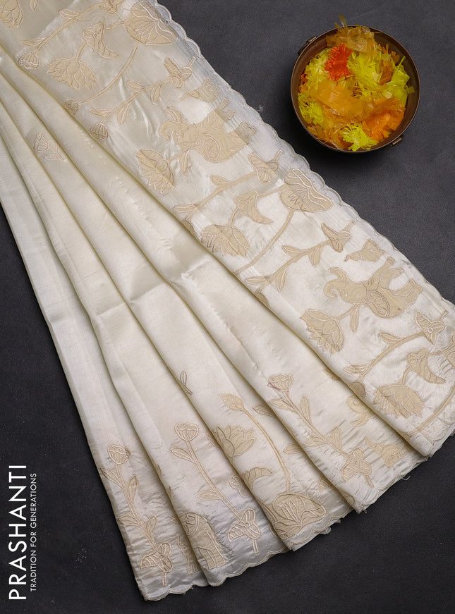 Semi tussar saree cream with floral embroidery work and applique work border