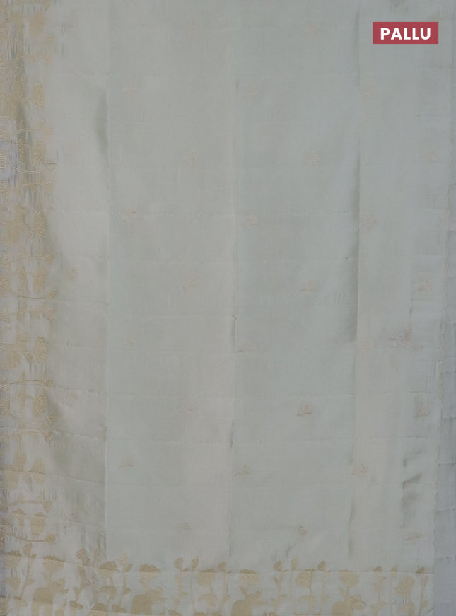 Semi tussar saree cream with floral embroidery work and applique work border