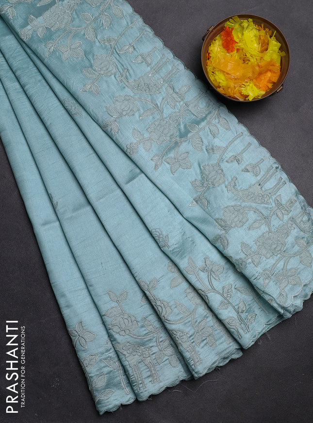 Semi tussar saree pastel blue with floral embroidery work and applique work border
