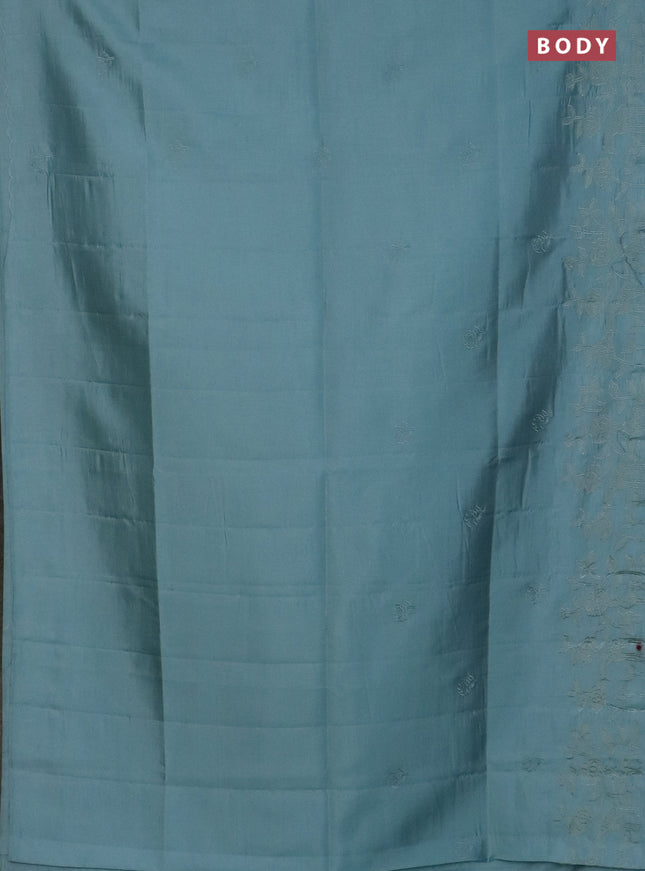 Semi tussar saree pastel blue with floral embroidery work and applique work border