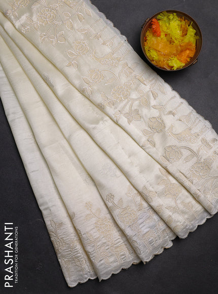 Semi tussar saree cream with floral embroidery work and applique work border