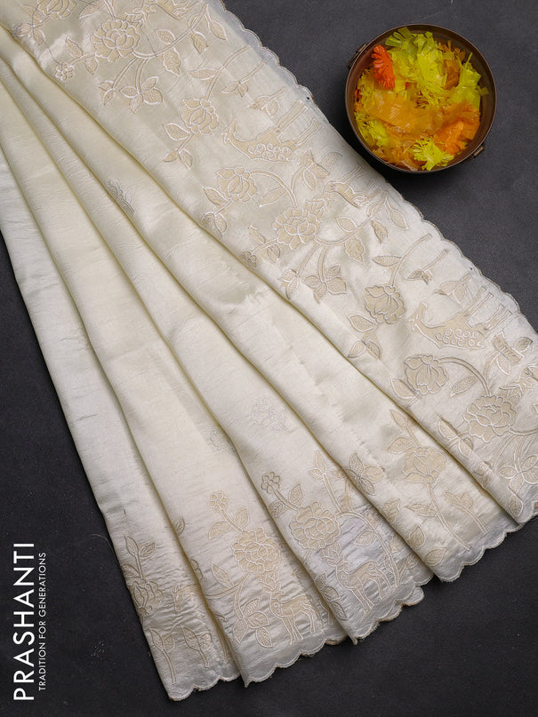 Semi tussar saree cream with floral embroidery work and applique work border