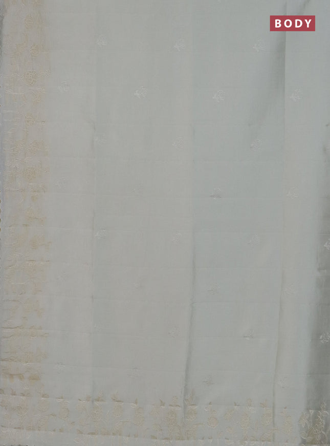 Semi tussar saree cream with floral embroidery work and applique work border