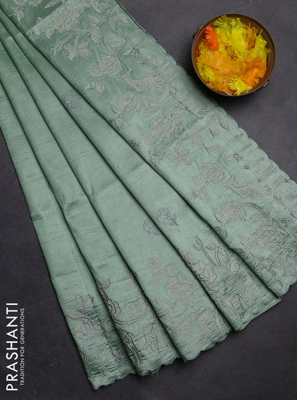 Semi tussar saree pastel green with floral embroidery work and applique work border