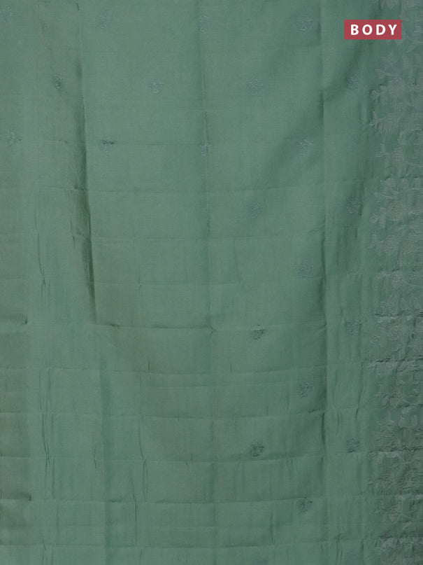 Semi tussar saree pastel green with floral embroidery work and applique work border