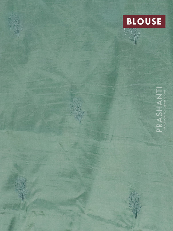 Semi tussar saree pastel green with floral embroidery work and applique work border