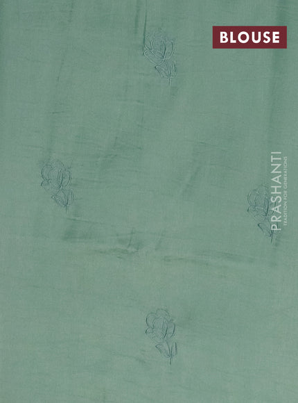 Semi tussar saree pastel green with floral embroidery work and applique work border