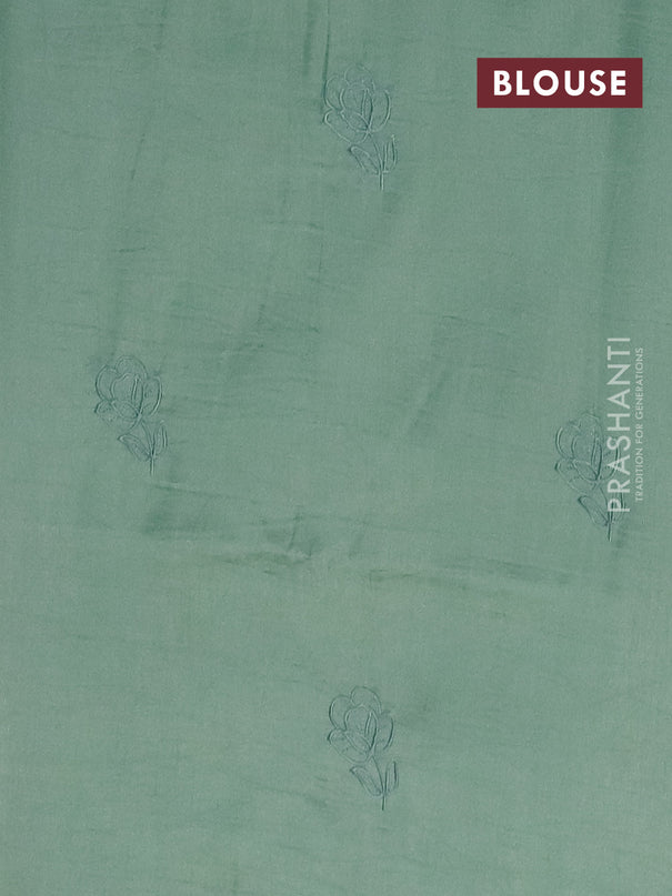 Semi tussar saree pastel green with floral embroidery work and applique work border