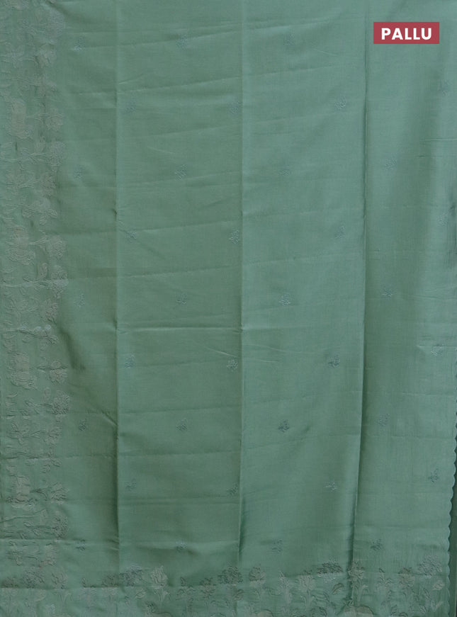 Semi tussar saree pastel green with floral embroidery work and applique work border