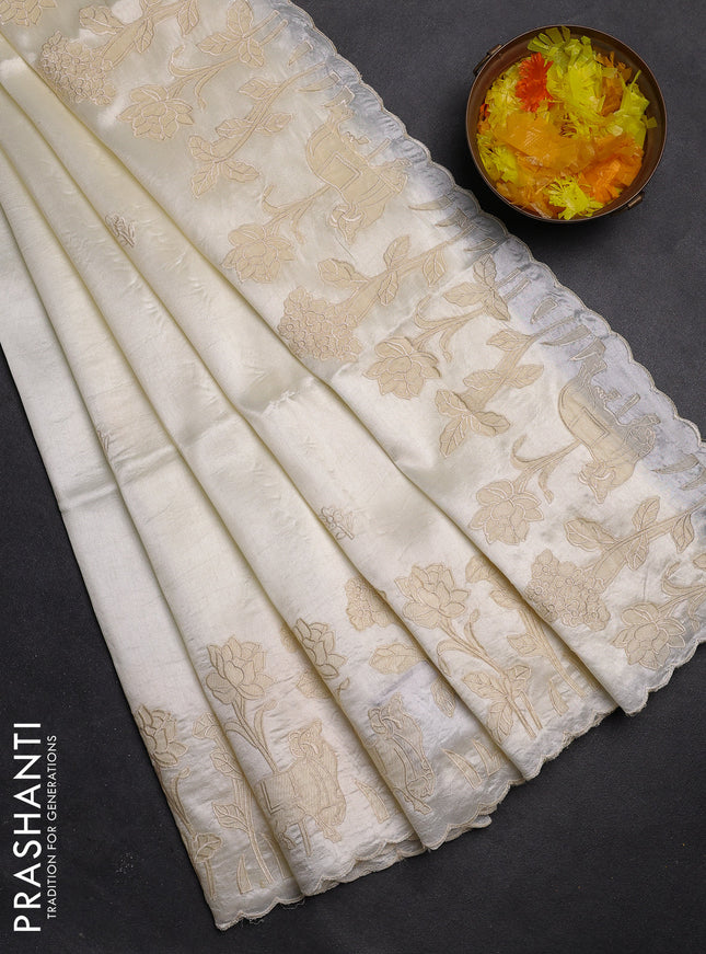 Semi tussar saree cream with floral embroidery work and applique work border