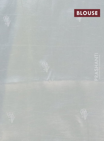 Semi tussar saree cream with floral embroidery work and applique work border