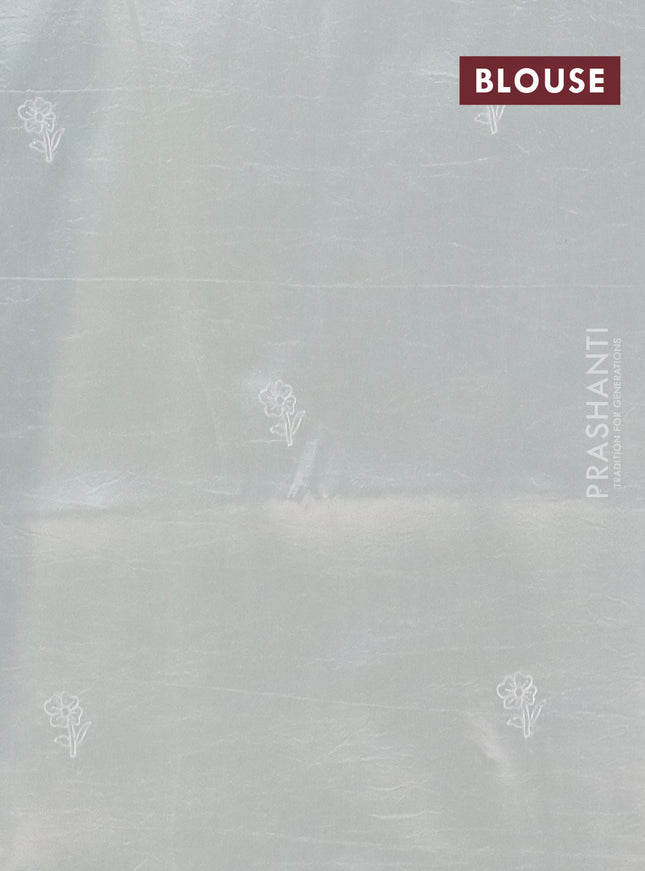 Semi tussar saree cream with floral embroidery work and applique work border