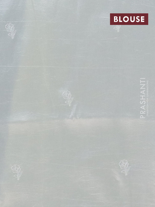 Semi tussar saree cream with floral embroidery work and applique work border