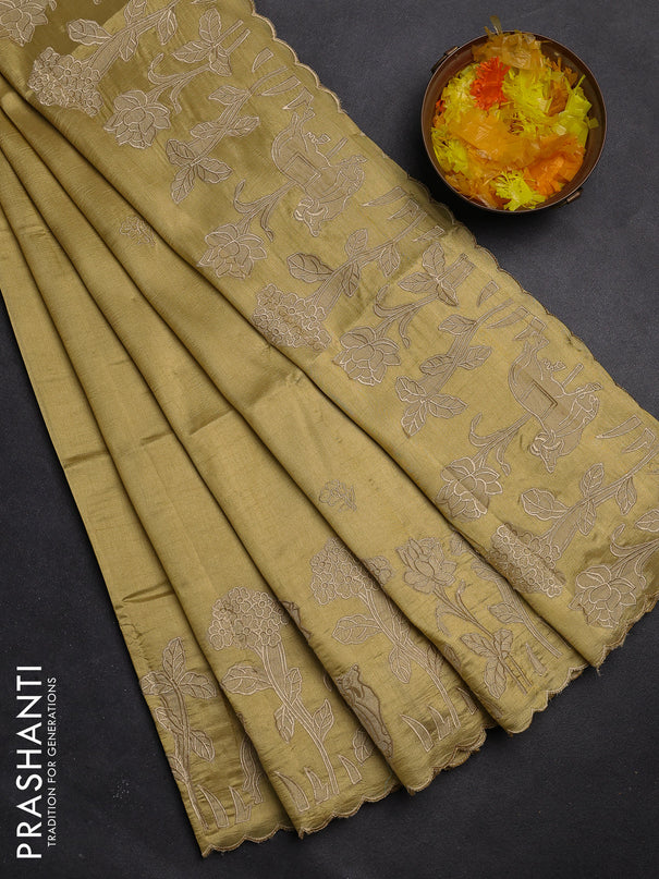 Semi tussar saree mustard shade with floral embroidery work and applique work border