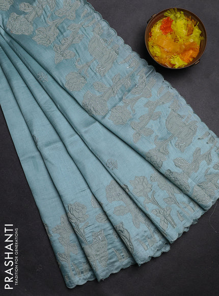 Semi tussar saree pastel blue with floral embroidery work and applique work border