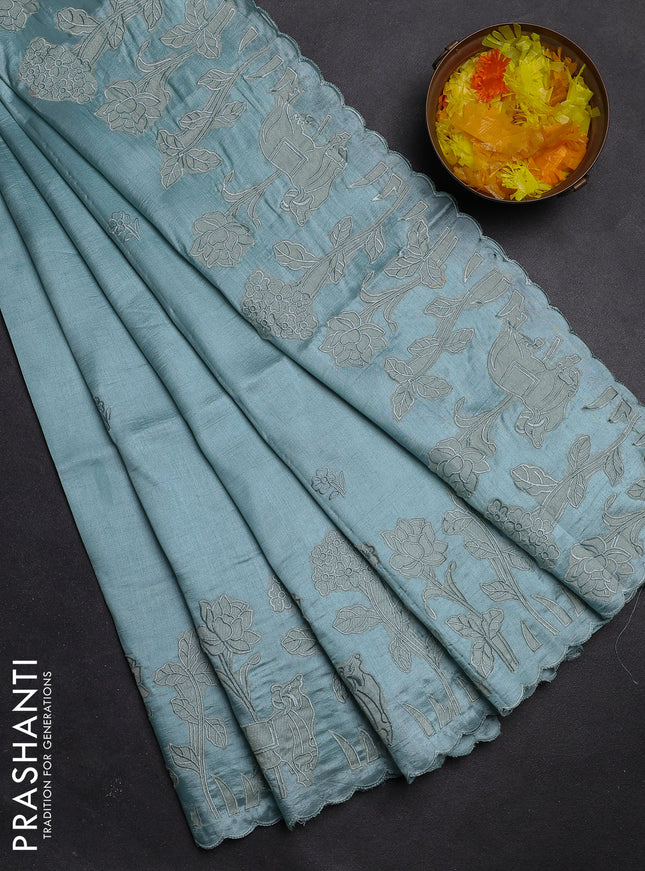 Semi tussar saree pastel blue with floral embroidery work and applique work border