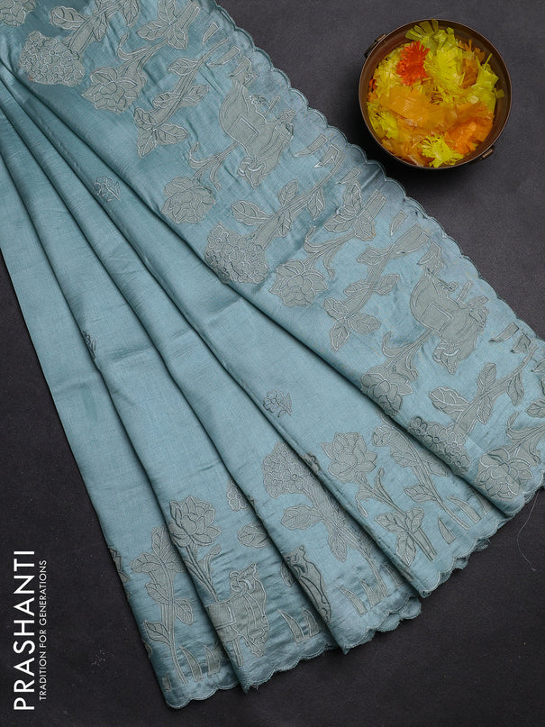 Semi tussar saree pastel blue with floral embroidery work and applique work border