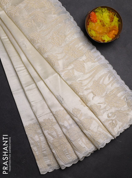 Semi tussar saree off white with floral embroidery work and applique work border