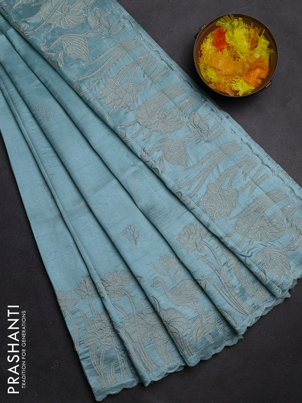 Semi tussar saree pastel blue with floral embroidery work and applique work border